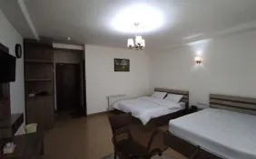 اتاق دوتخته دبل تراس دار رو به شالیزار و جنگل(طبقات1تا3) (اقامت با صبحانه)