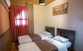 آپارتمان دو خوابه چهارنفره تیپB(طبقات 11 و 12جنوبی) نما خیابان
